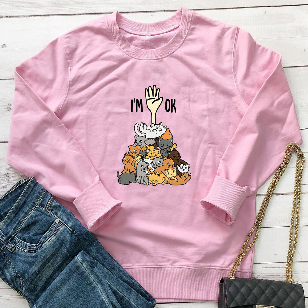 A pile of cat letter printed hoodies