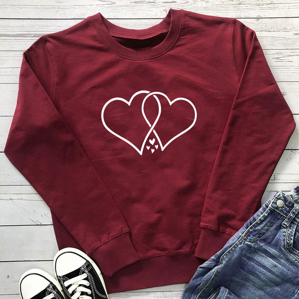 Round neck loose fitting long sleeved sweatshirt