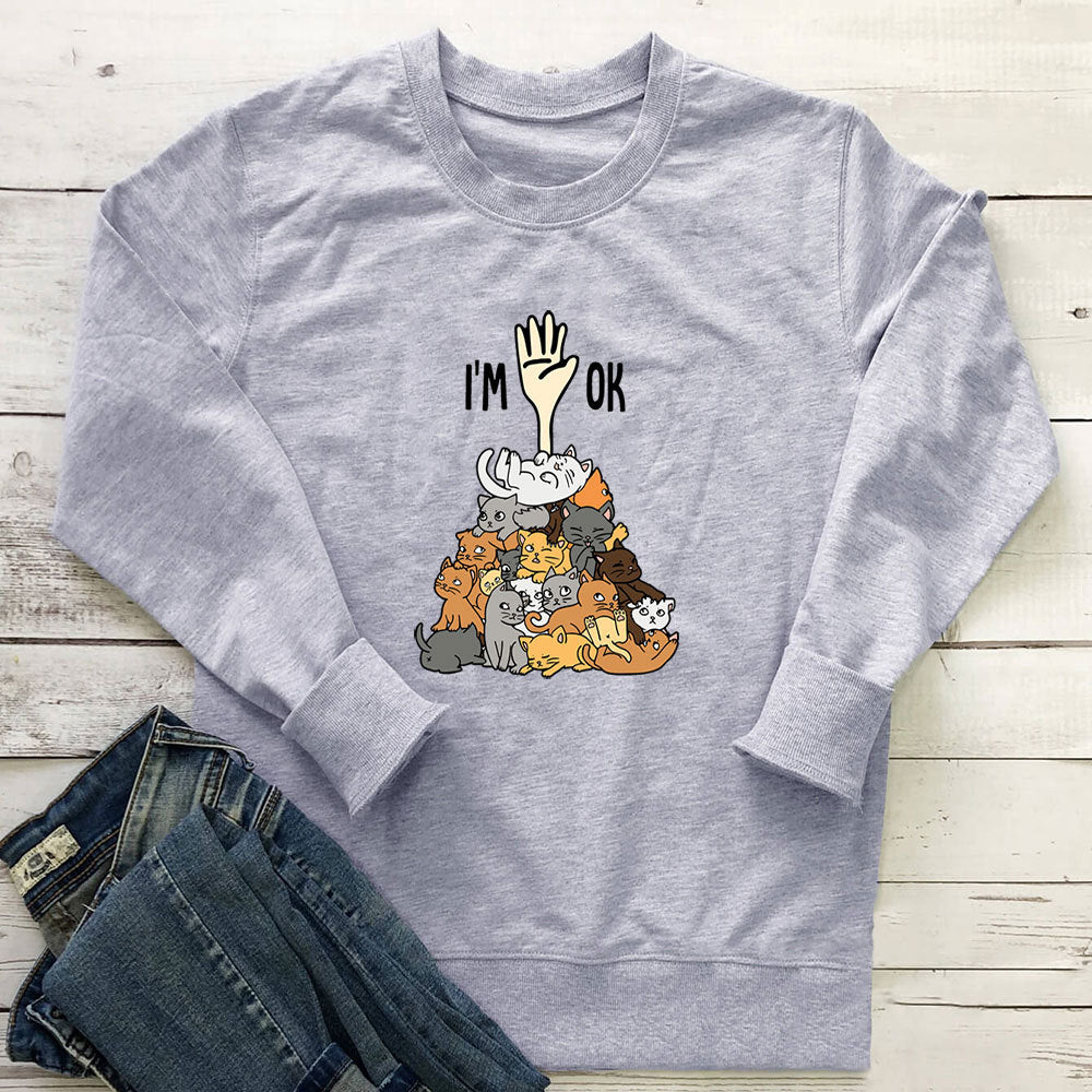 A pile of cat letter printed hoodies